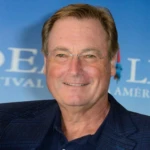 Guy East